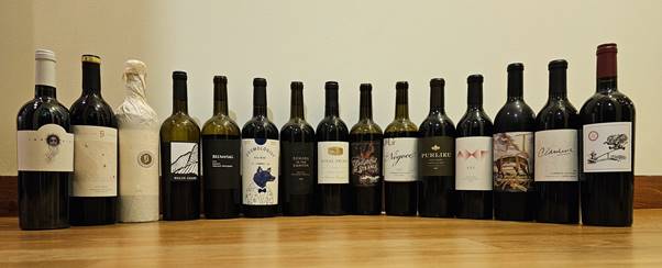 A row of wine bottles
Description automatically generated